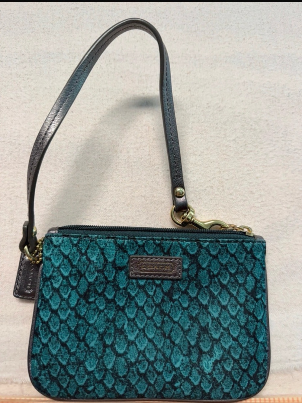 Coach Teal Scale-Pattern Wristlet with Leather Strap